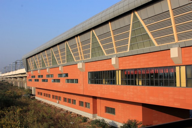 Sustainable train station architecture in Indonesia with LOPO Terracotta Cladding enhancing energy efficiency.